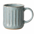 Tasse en céramique artisanale verte et beige