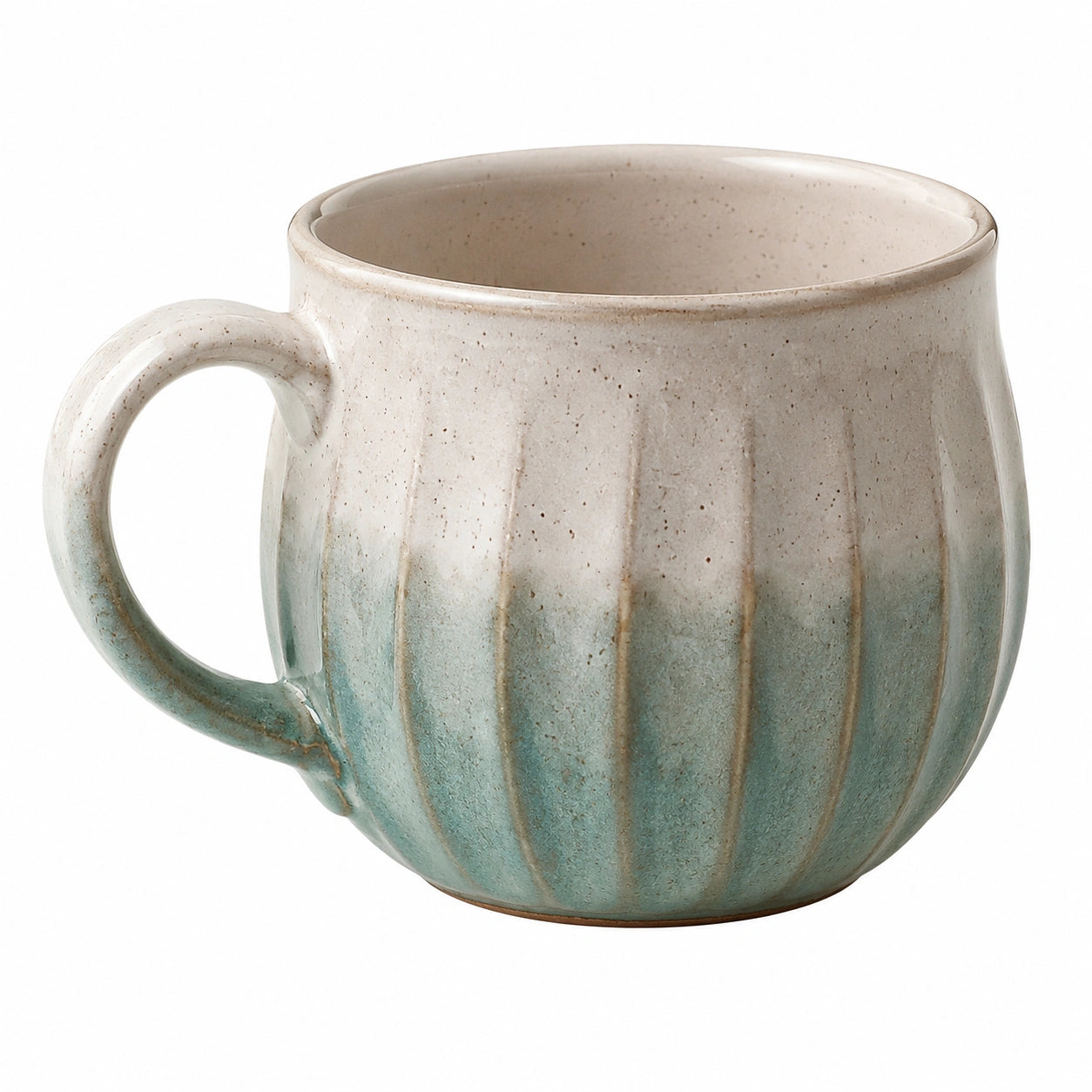 Tasse en céramique verte avec motif rayé